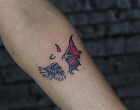 broken wings tattoo|angel and devil wings tattoo.